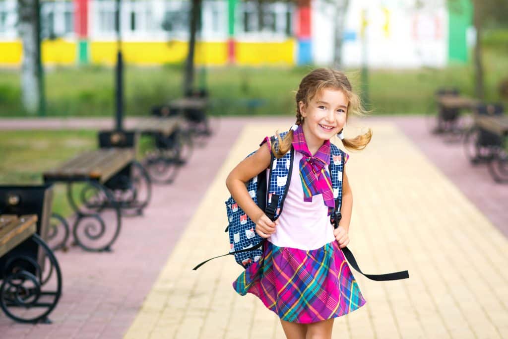 happy child with backpack